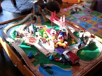 20171203 082156  setting up the circuit for the wooden railroad in the Play Room