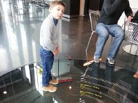 20170204 132544  Little guy standing on display of different scales