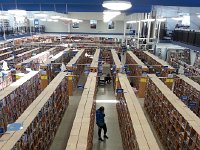 20171128 094410  Nikki checking the titles while the buyers evaluate our haul