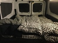 IMG 3255  The van set up of three people: it was actually okay. The campsite however was sodden. We parked on the hard surface near the dumpster.