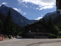 UUOM7241  busstop with gigantic dam behind