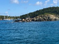 IMG 2969  a school of snorkeling tourists brought in from the big cruise ships circles the rock and scares away all the fish