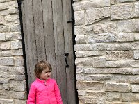 IMG 6650  Then, her curiosity leads her to this door which she very much wants to open. It is a tool shed with bare ground floor. Not too intersting