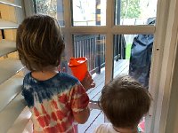 IMG 6699  Val and Liam looking out back door