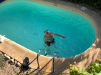 IMG 7419  exercising the wrong arm in the pool of the house at Domme