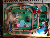 IMG 4652  meanwhile, in the playroom, trains are being laid out.a nicely done, Gampa!