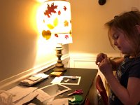 IMG 2402  back at the house, Val and Christine make paper snowflakes