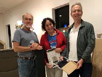 IMG 2493  it&#39;s time to hook up the sound bar (vertical piece of electronic Greg&#39;s holding). Jodi&#39;s holding the indecipherable instructions