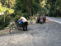 IMG 0796  rural transport and a guy bringing back his backpack sprayer (not bio here)