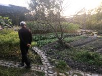 IMG 6982  gardner inspecting the garden that (at least in part) fed us during our visit
