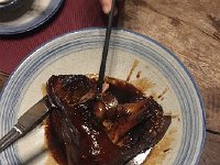 IMG 6997  Austin orders the house specialty: braised pig hock - yum!