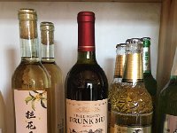 IMG 7055  maybe the most important photo of the trip, vin de winery (zoom in to see the description) &#34;with a long after taste&#34; - I&#39;ll bet!