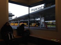 Waiting in the warm waiting room for the bus in Visp...