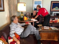 Freddie chills while Jim and Greg work on the Raspberry Pi to upload our Nepal photos