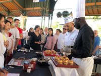 cooking and serving of sausage sandwiches