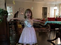 Christine played with her and the rose petals