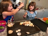 while Val and May play with shells