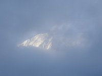 Moraine, fog and ice peak