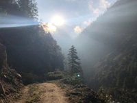 Down a rough road gouged into the canyon wall