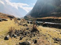 Past a long mani wall