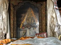 There are plexiglass plates covering the statuary