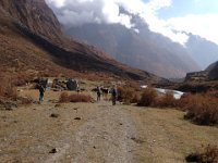 Down into the broad bottom of the upper Tsum Valley the clouds are rolling in again