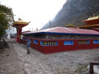 A periphery of prayer wheels