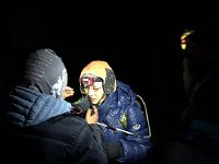 The mask comes with a hat/hood