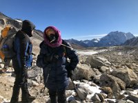 Cold again: Christine puts on her down