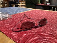 We try to repair Christine's glasses using Superglue that I had brought (don't travel without it)