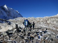 The trail disappears into the rock fields
