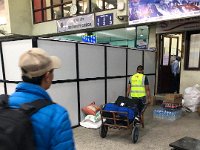 our bags head toward the scales, Mouli is following