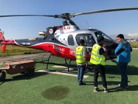 Our pilot, who has been waiting with us (but didn't alert us to his status) is on the right