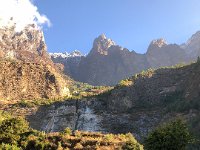 The towering peaks above us