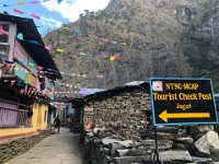 ...Kaji checks in with the authorities. Note the flagstone path...