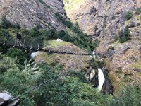 Lovely bridge over a raging side torrent