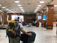 Meanwhile, at the airport, the bags made it to Kathmandu and Greg and Brigitte head to the exit
