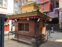 Meanwhile, having arrived the night before from Shanghai, Christine was beginning to explore Kathmandu. This is the small temple at the "gate" to the Nepal Cottage Resort driveway