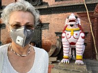 The point of this photo is the statue (one of a pair guarding a gate to a palace) to my right