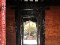 passed the giant guards into the courtyard