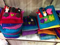 Felted wool products are very popular in the gift shops. These bags (for four points) have pockets (five points) for puppets (many points!)