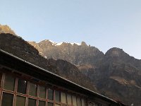 Early morning Mingma takes a photo or checks his messages before leaving WiFi in Lamagaon