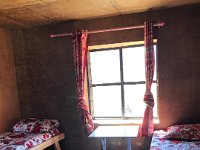 Bri wasn't feeling well. She took the first room proposed on the ground level. Our room was chosen for sun and the view