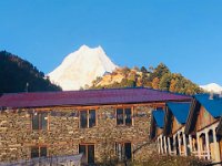 First sunlight hits Lho Gaon buildings