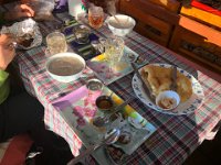 Apple pie loaded with cinnamon and walnuts, while porridge and Tibetan bread await Greg and Brigitte
