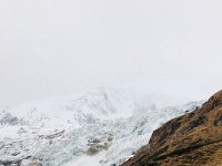 The glacier disappears into fog