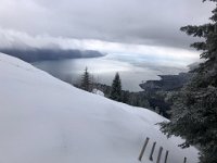 Untracked snow with a view down the lake
