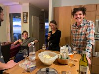 Fondue prep. Tasting different cheese types. The hair? It's a style thing