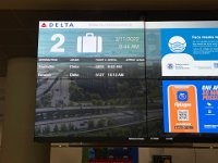 A few hours later, Titine was waiting for the travelers at the luggage carousel in Logan airport