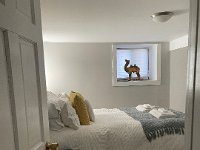 A large bedroom where Val and Liam will sleep